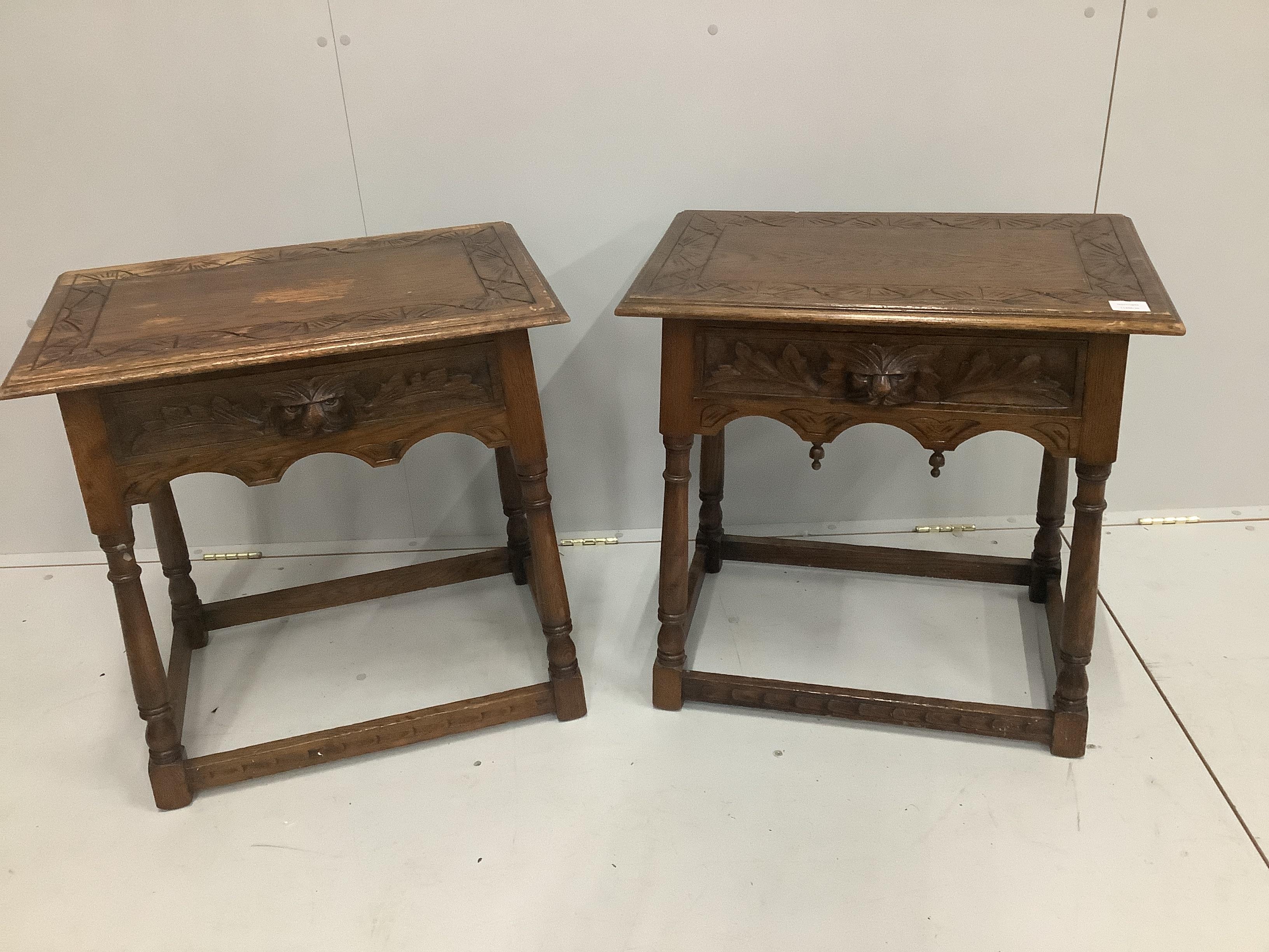 A pair of early 20th century carved oak bedside tables, width 66cm